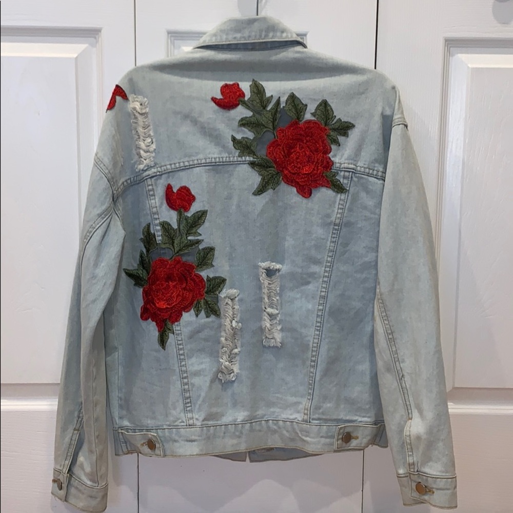 Distressed rose denim jacket